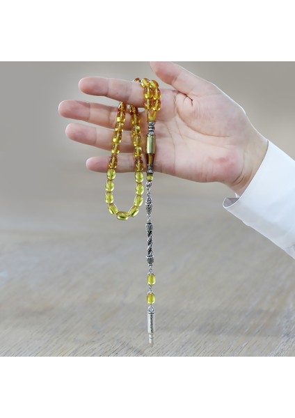 Kararmaz Metal Halat Püsküllü Kurşun Nakkaş Imameli Kapsül Kesim Sarı Ateş Kehribar Tesbih modelleri