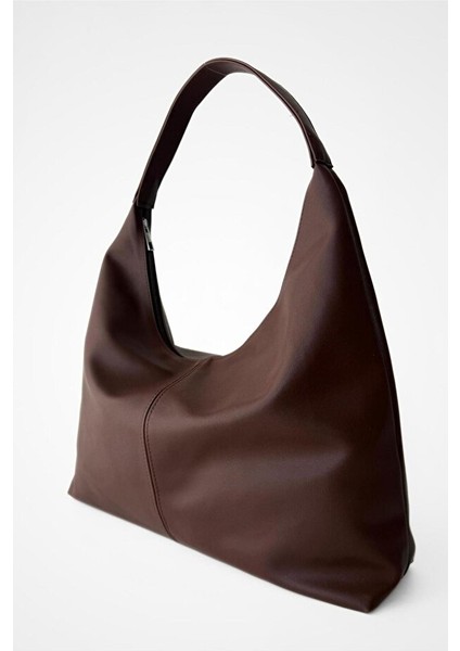 Salaş Görünümlü ve Geniş Hacimli Suni Deri Kadın Shopper Omuz Çantası fırsatları