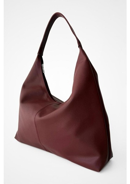 Salaş Görünümlü ve Geniş Hacimli Suni Deri Kadın Shopper Omuz Çantası