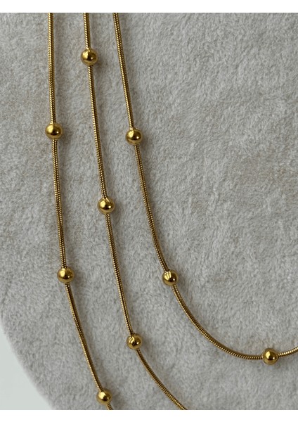 Üç Sıralı Dorika Taşlı Gold Kolye