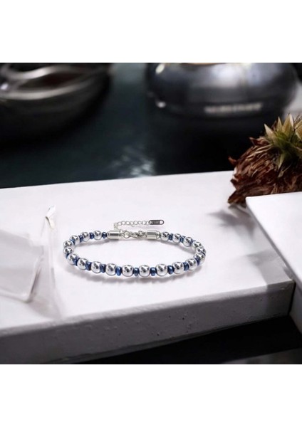 Gümüş ve Mavi Renkli Hematit Ayaranabilir Çelik Zincir Bileklik 9592B10D8 fiyatları