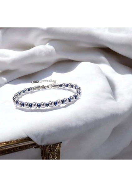 Gümüş ve Mavi Renkli Hematit Ayaranabilir Çelik Zincir Bileklik 9592B10D8 modelleri