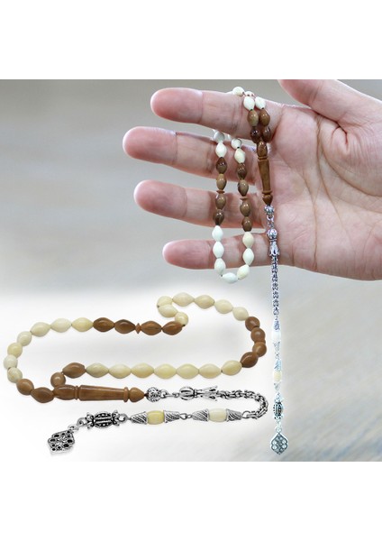 Kararmaz Metal Arnavut Zincir Püsküllü Kuka Imameli Arpa Kesim Naturel Renk Deve Kemiği Tesbih fiyatları