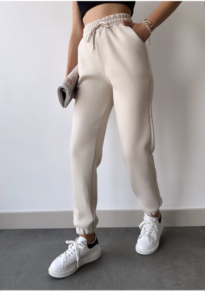 Kadın Bej Kışlık Kalın Içi Polarlı Yüksek Bel Paçası Lastikli Basic Jogger Eşofman Altı fırsatları