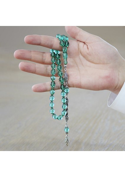 Kararmaz Metal Halat Püsküllü Arpa Kesim Şeffaf Turkuaz Ateş Kehribar Tesbih modelleri