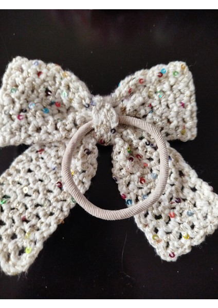 Fiyonk El Örgüsü Lastikli Toka Simli Pullu modelleri