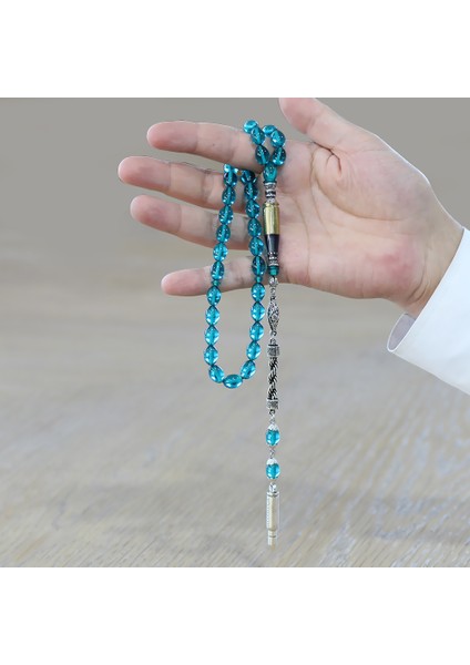 Kararmaz Metal Halat Püsküllü Kurşun Nakkaş Imameli Arpa Kesim Turkuaz Ateş Kehribar Tesbih modelleri