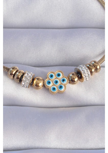 316L Çelik Gold Renk Zirkon Taşlı Nazarlı Çiçek Tasarımlı Bileklik - Lisinya fiyatları