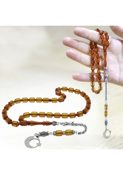 Kararmaz Metal Püsküllü Uçlu Kapsül Isim Yazılı Ayyıldız Plakalı Şeffaf Sarı Ateş Kehribar Tesbih modelleri