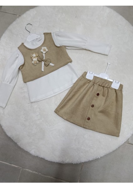 Fiyonklu ve Papatyalı Yeleği ve Eteği Süet Fitilli Buluz Kız Çocuğu 3 'lü Takım modelleri