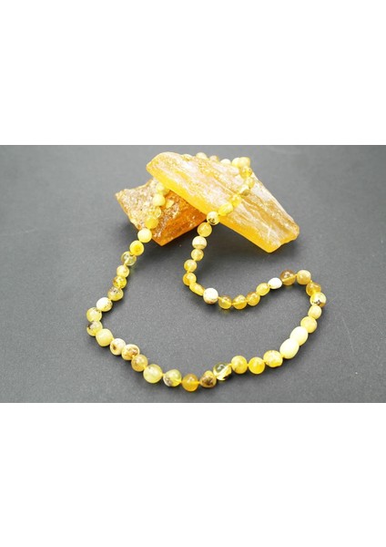 Fosilli Doğal Kesim Damla Kehribar Yetişkin Kolye fiyatları