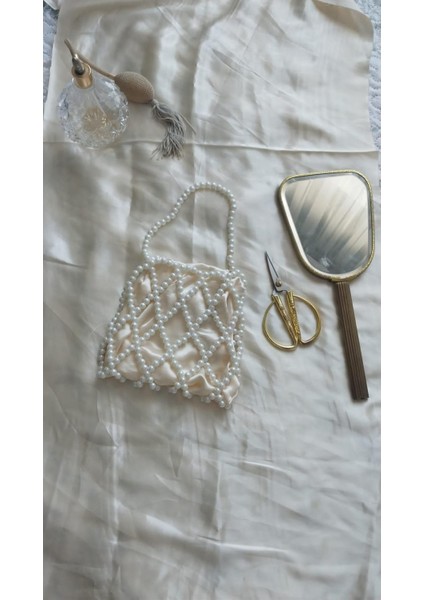 Inci Boncuk Detaylı Saten Kese Çanta modelleri