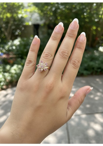 Pembe Çiçek Model Taşlı Dönen Gold Renk Stres Yüzüğü (Çiçek Figürü Dönmektedir) fiyatları