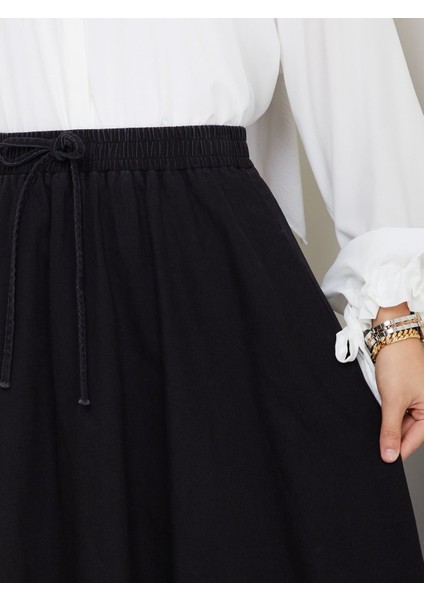Beli Lastikli Ipli Kot Kloş Etek Siyah modelleri