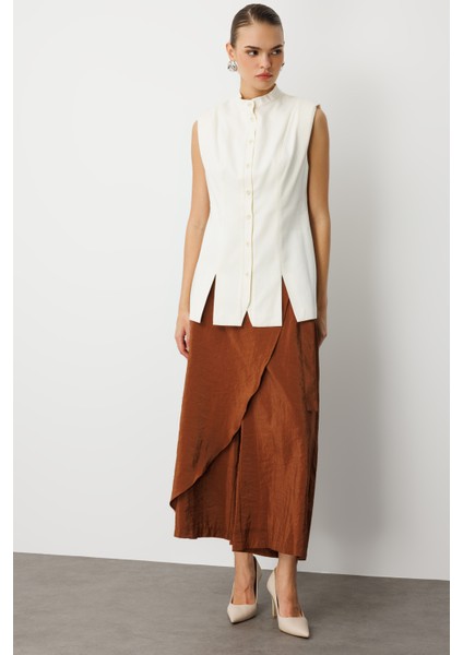 Dik Yaka Yırtmaç Detaylı Ekru Yelek indirimleri