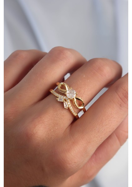 Pirinç Ayarlamalı Gold Renk Zirkon Taşlı 2li Görünüm Fiyonk Yüzük