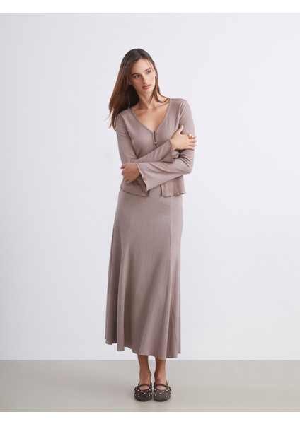 Beli Lastikli Dokulu Pileli Etek