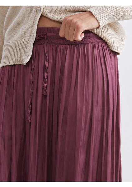 Beli Lastikli Saten Pileli Etek modelleri