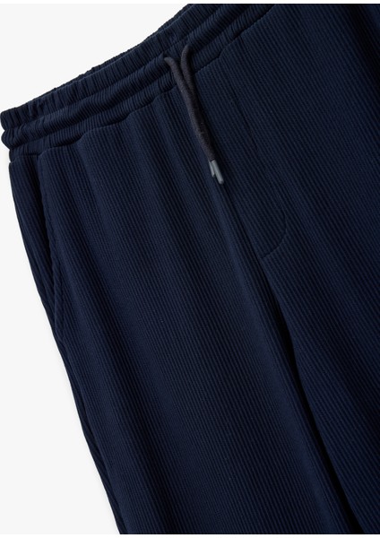 Pamuklu Cepli Regular Fit Beli Bağcıklı Eşofman Altı modelleri