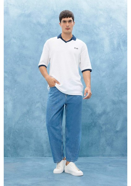 Boxy Fit Rahat Kesim Polo Yaka Kontrast Renkli Dokulu Kısa Kollu Tişört fiyatları