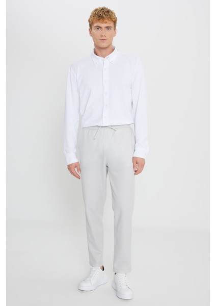 Pamuklu Standart Fit Normal Kesim Beli Bağlamalı Yan Cepli Jakarlı Eşofman Altı fiyatları