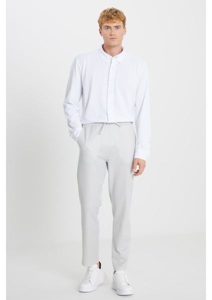 Pamuklu Standart Fit Normal Kesim Beli Bağlamalı Yan Cepli Jakarlı Eşofman Altı modelleri