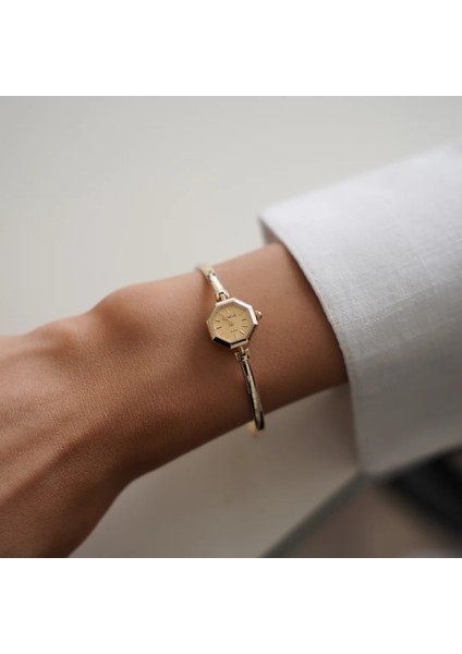 Minimal Geneve Omega Kordonlu Petek Kadran Altın Saat fiyatları