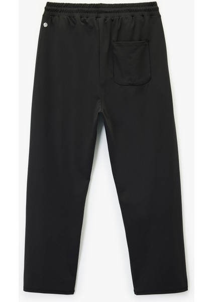 Rahat Kalıp Cepli Beli Bağcıklı Geniş Paça Spor Eşofman Altı fiyatları