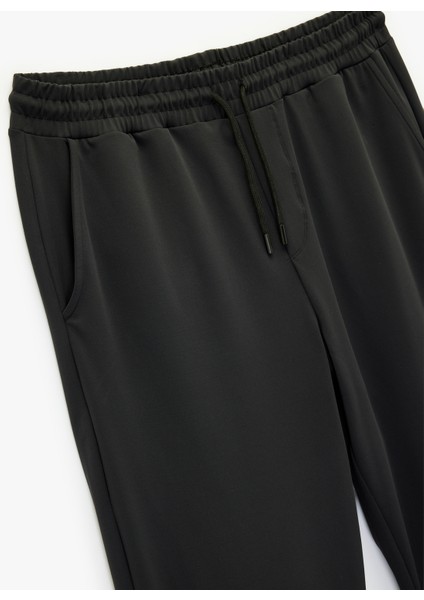 Rahat Kalıp Cepli Beli Bağcıklı Geniş Paça Spor Eşofman Altı modelleri