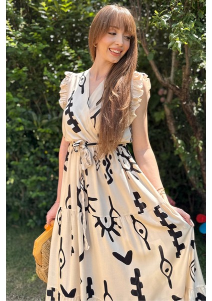 Sırt Detaylı Bej Desenli Midi Elbise modelleri