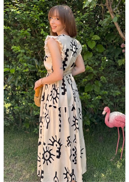 Sırt Detaylı Bej Desenli Midi Elbise