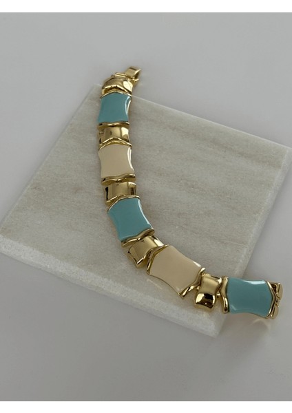 Mavi ve Krem Renkli Altın Detaylı Kemikli Bileklik fırsatları