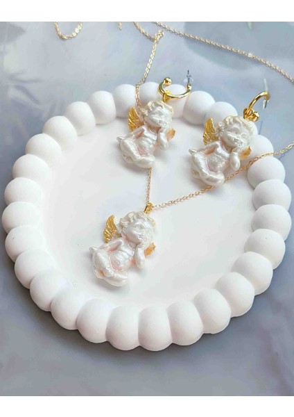 Golden Angel Baby Wings Inci Beyazı Küpe ve Kolye Seti - Zarif ve Masum fiyatları
