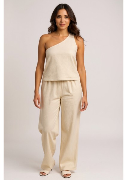 Kadın Beyaz Tek Omuzlu Şık Bluz &amp; Geniş Paça Pantolon Ikili Takım modelleri