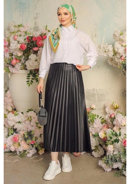 Zarif ve Modern Pileli Parlak Krep Gizli Lastikli Siyah Etek indirimleri
