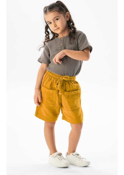 Batı Cep Detaylı Yazlık Müslin Kız Çocuk Şort Hardal Hrd fırsatları