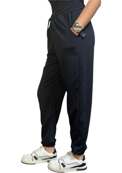 Kadın Bayan Paça Lastikli Bel Lastikli Çift Cepli Cepler Fermuarsız Bağcık Kordonlu Eşofman Altı