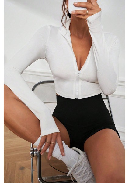 Kadın Beyaz Uzun Kol Fermuarlı Parmak Geçme Detaylı Dik Yaka Crop Top Bluz fırsatları
