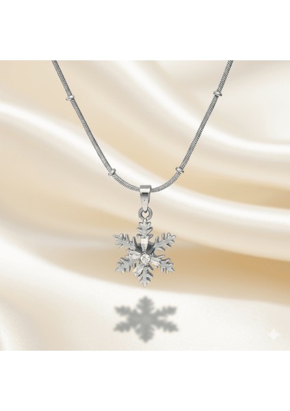 Kadın Çelik Kolye - Kar Tanesi Tasarım - Beyaz Zirkon Taşlı - Stres Çarkı Model - Gümüş Renk fırsatları