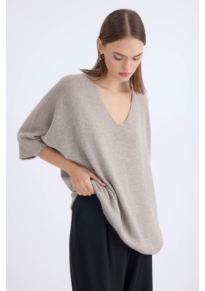 V Yaka Yarım Kol Simli Salaş Bluz fiyatları