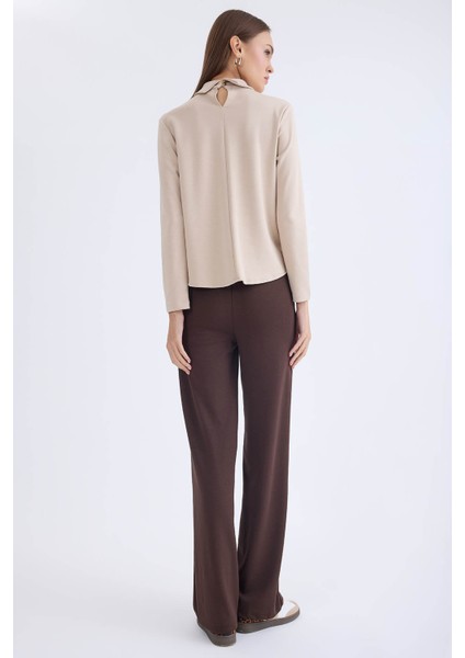 Önü Dikişli Geniş Paça Beli Lastikli Pantolon indirimleri