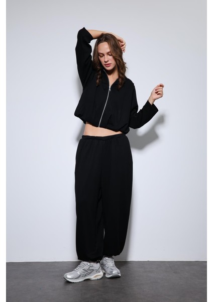 Siyah Volümlü Ceket ve Paça Lastikli Eşofman Takım fiyatları