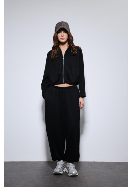 Siyah Volümlü Ceket ve Paça Lastikli Eşofman Takım fırsatları