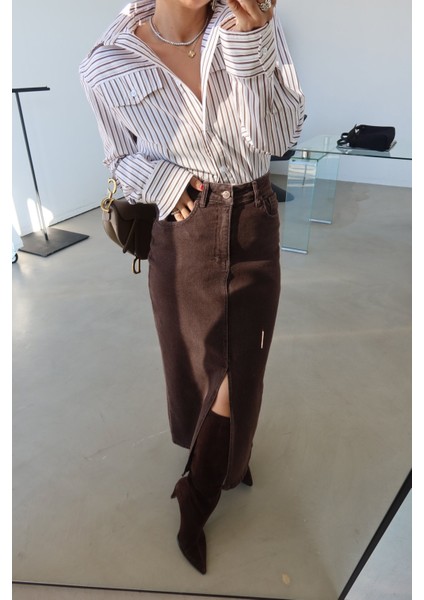 Önden Yırtmaçlı Yıkmalı Denim Etek indirimleri