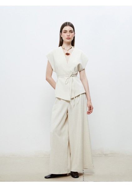 Kruvaze Yaka Keten Görünümlü Bluz fiyatları