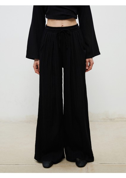 Beli Lastikli Dokulu Kadın Pileli Pantolon fiyatları