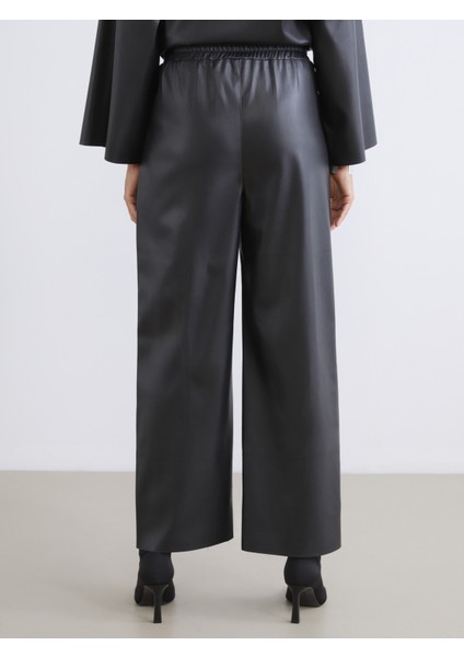 Beli Lastikli Deri Görünümlü Kadın Pantolon fırsatları