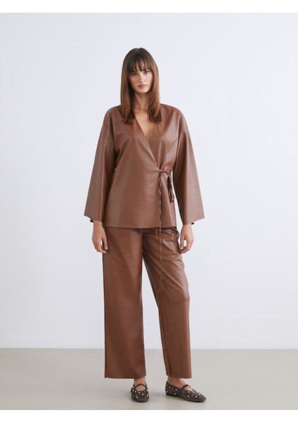 Beli Lastikli Deri Görünümlü Kadın Pantolon