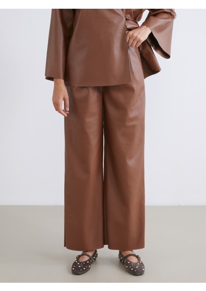 Beli Lastikli Deri Görünümlü Kadın Pantolon fiyatları