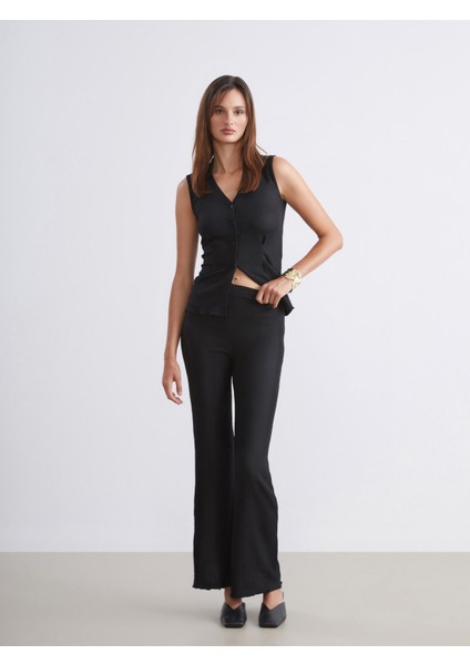 Beli Lastikli Dokulu Ispanyol Paça Kadın Pantolon